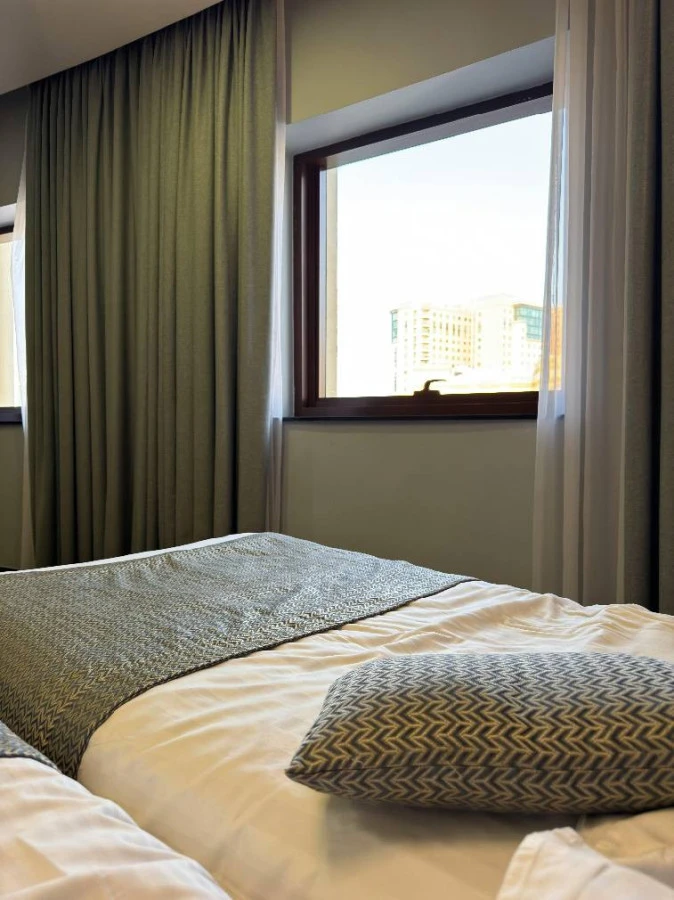 Bed in a shared room near the metro
