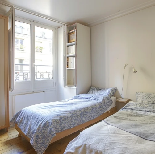 Lit simple en chambre partagée à Paris 13e